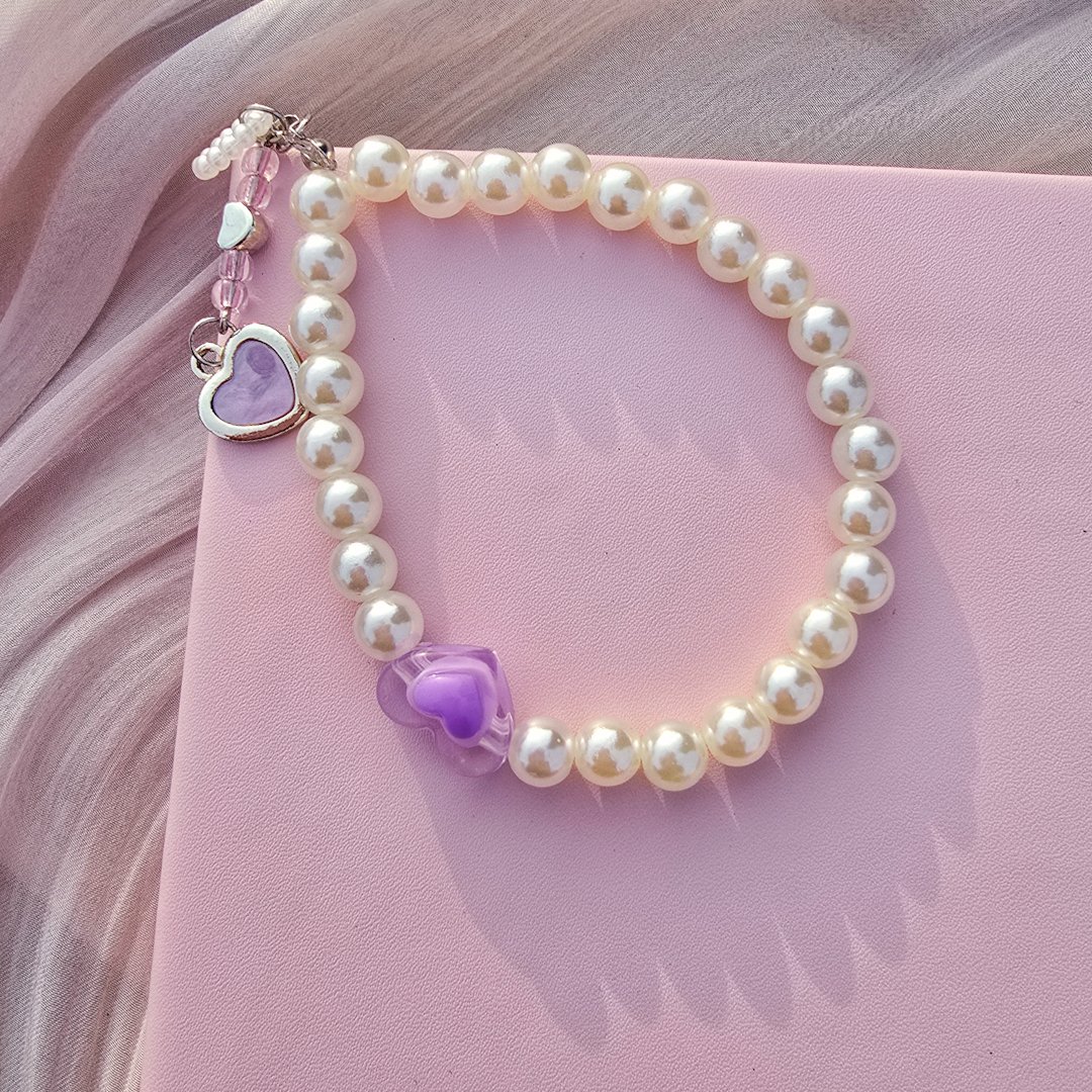 2025/12/1000159589.jpg purple heart charm - الصورة 1